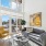 a living room with a couch and chairs