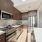 the kitchen with stainless steal appliances