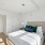 a bedroom with nightstands