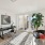 a room with a staircase and desk